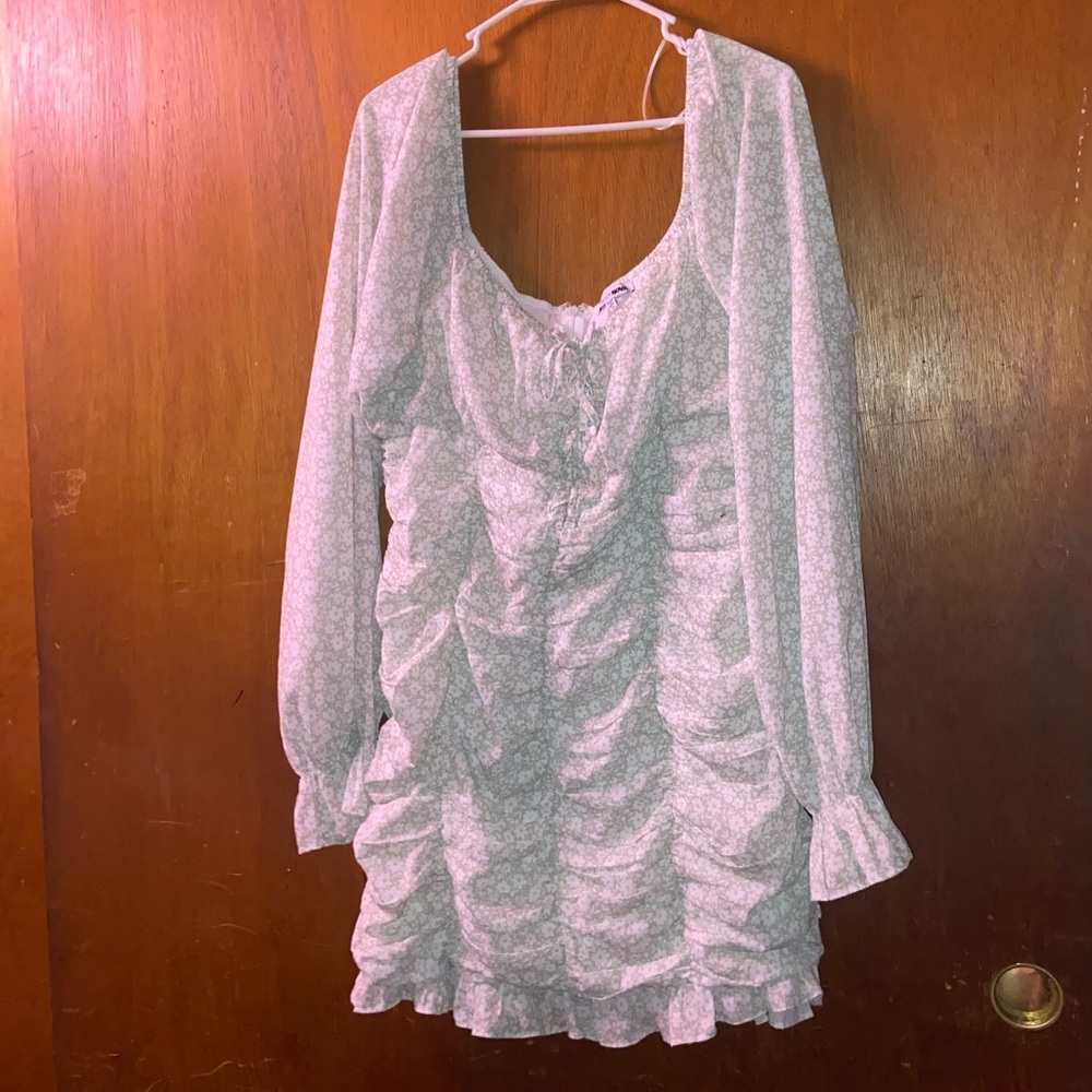 Fashion Nova. Long-sleeved, ruched, floral mini dress.